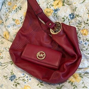 Red retro, Michael Kors hobo bag with matching wallet.
